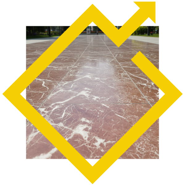 Polished red marble tiles representing global natural stone brokerage.